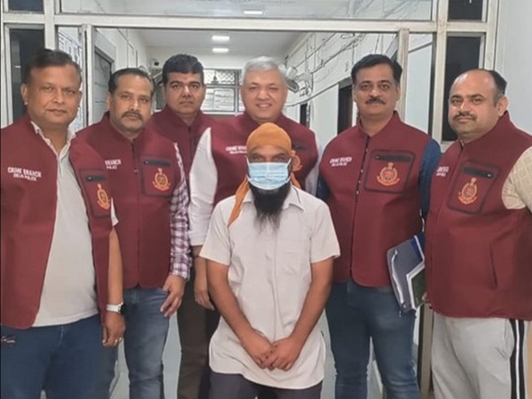 Delhi police Crime Branch with the arrested accused persons. (Photo/ANI)