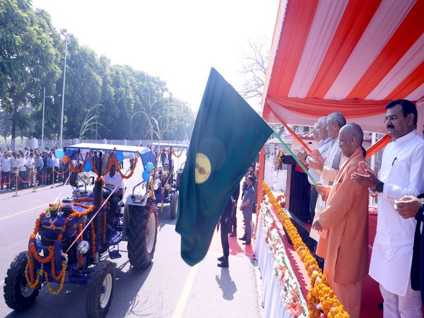 Uttar Pradesh Chief Minister Yogi Adityanath flags off 77 tractors. (Photo/ANI)