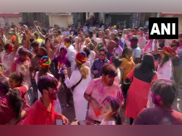 People celebrate the festival of colours, Holi, in Udaipur