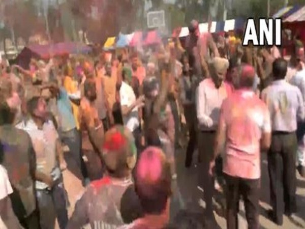 BSF jawans celebrate the festival of Holi at Border Security Force (BSF) HQ in Khasa