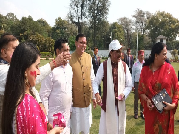 CM Dhami celebrating Holi at his residence. (Photo/ ANI)