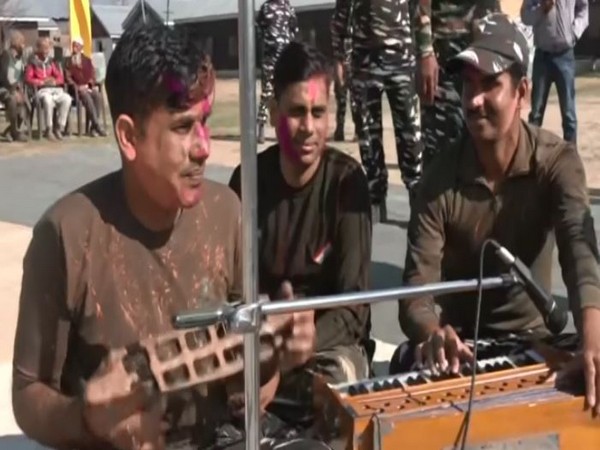 CRPF Jawans celebrate Holi in J&K's Pulwama (ANI) 