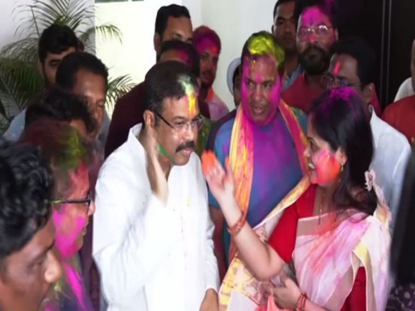 Union Minister Dharmendra Pradhan celebrates Holi at his residence. (Photo/ANI)