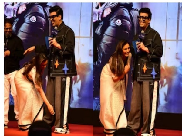 Rani Mukherjee touches feet of Karan Johar (Image Source: Twitter)