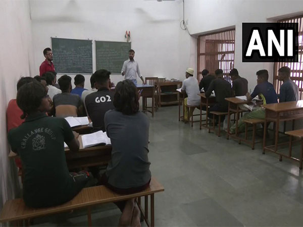 Lajpore Central Jail inmates preparing for the exams. (Photo/ANI)