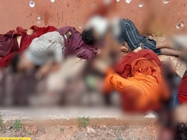 Bodies lie scattered around the village monastery following a junta raid. (Photo Credit - KNDP)