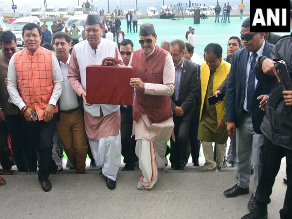 Uttarakhand Chief Minister Pushkar Singh Dhami and  Finance Minister Premchand Aggarwal 