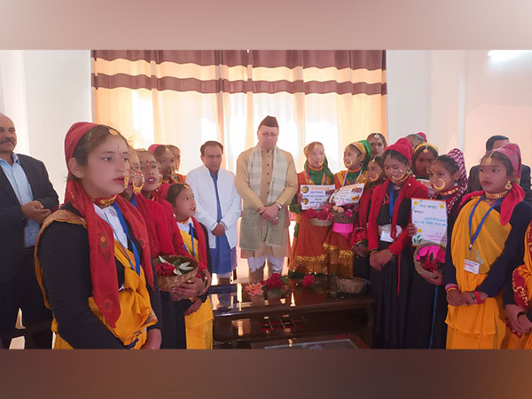 Uttarakhand Chief Minister Pushkar Singh Dhami with school children (Photo/ANI)