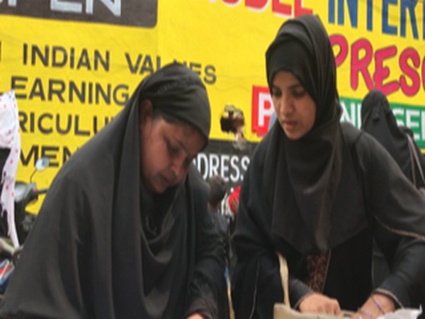 women filing form for updating documents