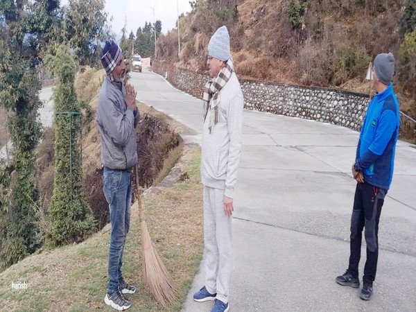 Chief Minister Pushkar Singh Dhami interacts with the  sanitation workers (Photo:ANI)