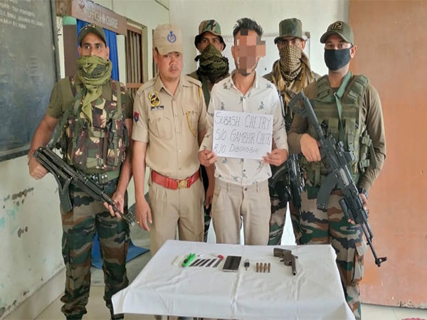 Apprehended man by Army and police (Photo/ANI)