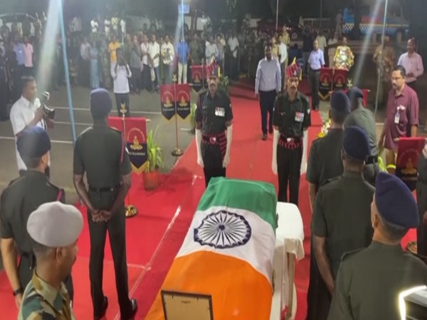 Army jawans pay trubutes to Major Jayanth A, who perished in the chopper crash. (Photo/ANI)