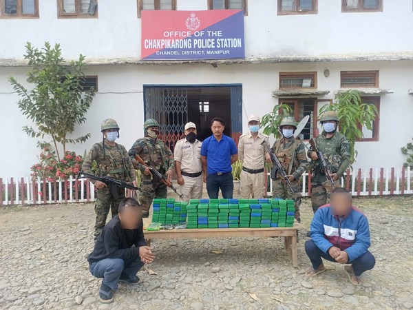 Assam Rifles with the contraband items in Manipur. (Photo/ANI)