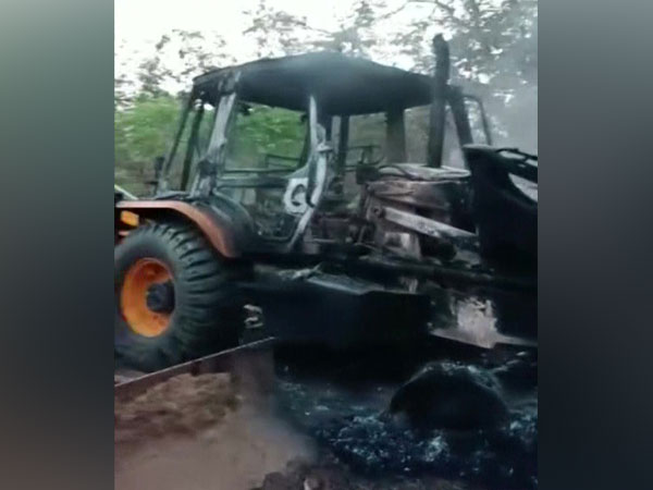 Visual of vehicle set ablaze by Naxals (Photo/ANI)