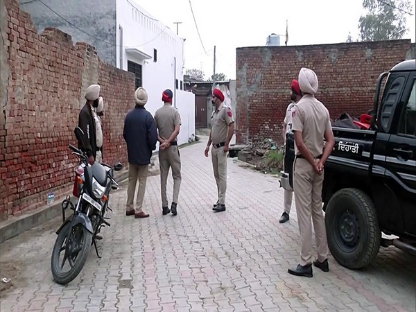 Police personnel deployed outside the residence of 'Amritpal Singh (Photo/ANI)