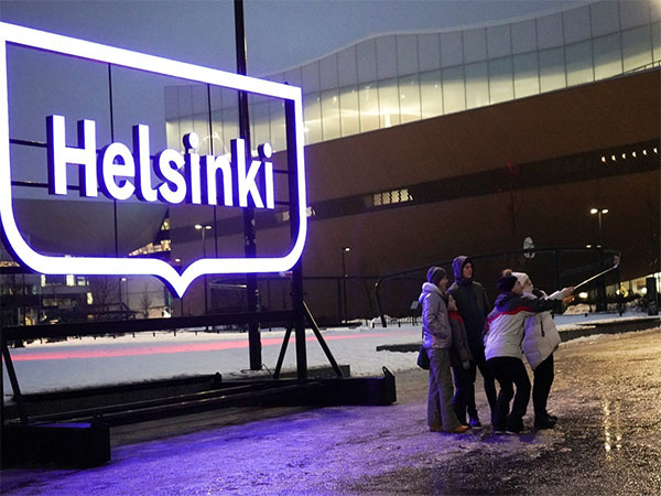 People pose for a selfie in Helsinki, Finland. (File Photo/Reuters)