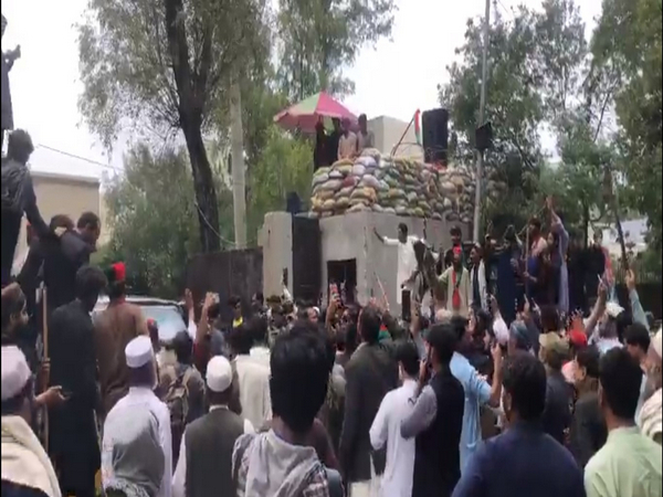 PTI Chief Imran Khan's car surrounded by PTI workers as he leaves for Lahore High Court. (Photo/Twitter: @PTIofficial)
