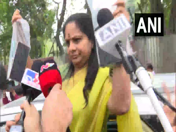Visuals of K Kavitha displaying her phones outside ED's office (Photo/ANI)