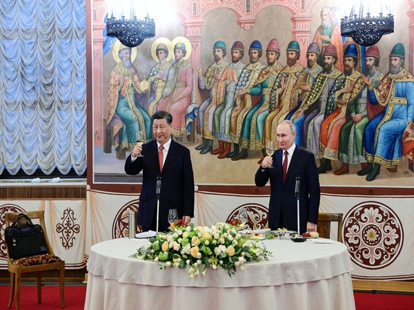 Russian President Vladimir Putin and Chinese President Xi Jinping attend a reception at the Kremlin in Moscow, Russia March 21, 2023. (Photo/Reuters)