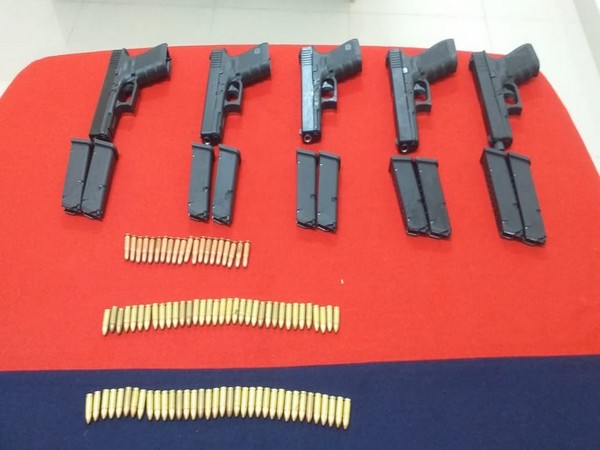 BSF troops recover a consignment of one packet dropped through drone along the international border in Punjab. (Photo/ANI)