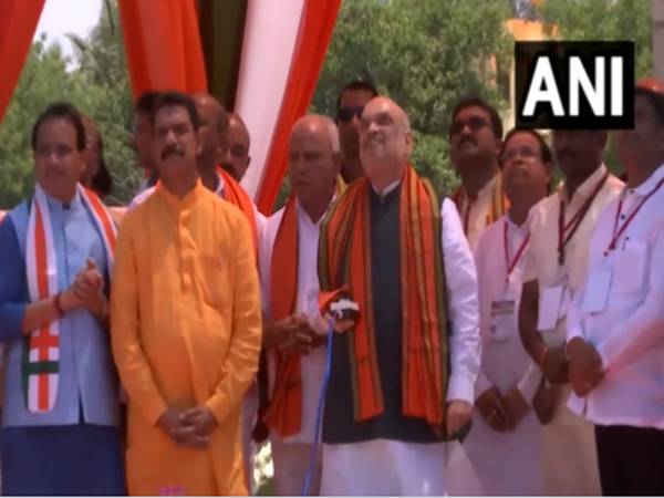 Home Minister Amit Shah hoist 103 feet Tricolor at at Gorata ground in Bidar district (Photo\ANI)