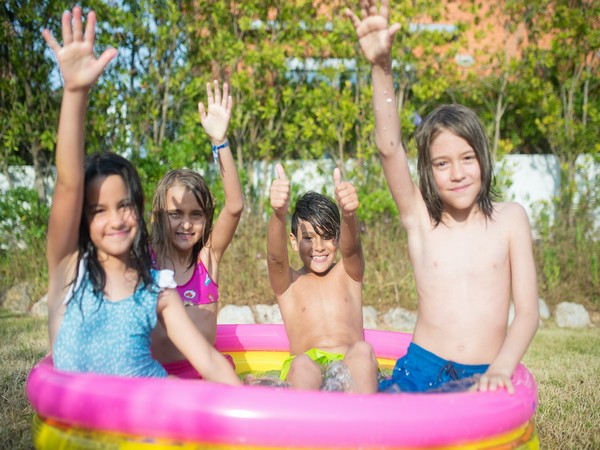 Children having fun in water blob. (Image Source: Pexels, Twitter)