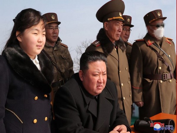 North Korean leader Kim Jong Un with his daughter at a weapon test site, undisclosed location. (Photo Credit: KCNA)