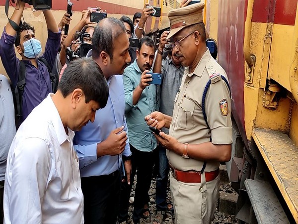 NIA team inspects train coaches at Kannur Railway Station. (Photo/ANI)