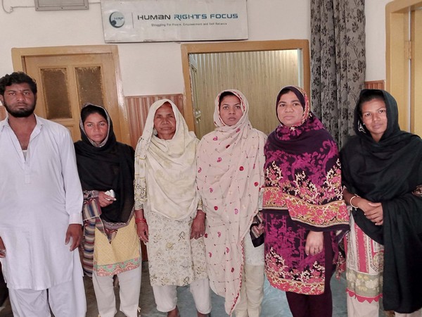 Nasreen bibi's family in HRFP office (Image Credit: Human Rights Focus Pakistan)