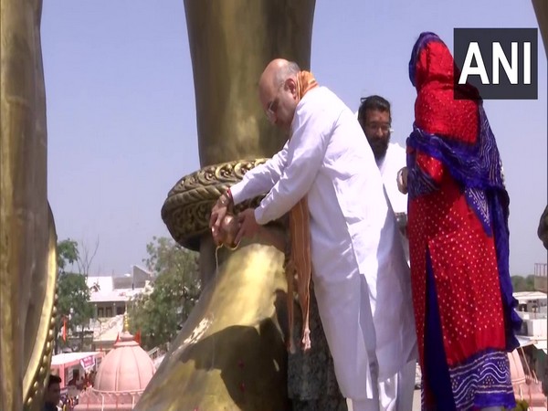 Union home minister Amit Shah unveiling 54 feet tall statue of Lord Hanuman at Sarangpur temple in Botad district, Gujarat (Photo/ANI)