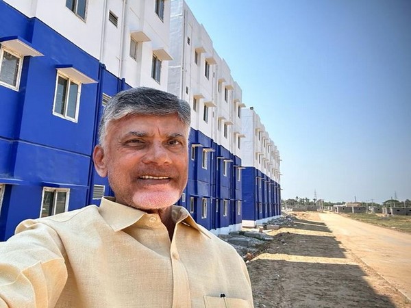 TDP president Chandrababu Naidu clicking pictures at APTIDCO site (Photo/ANI) 