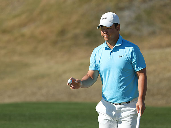 Korean golfer Tom Kim in action during 
