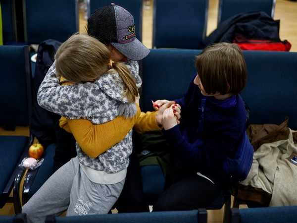 Ukrainian children reunited with their families. (Photo Credit - Reuters)