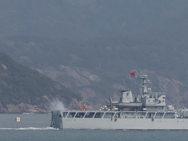 A Chinese warship fires towards the shore during a military drill near Fuzhou near the Taiwan controlled Matsu Islands (Image Credit: Reuters)