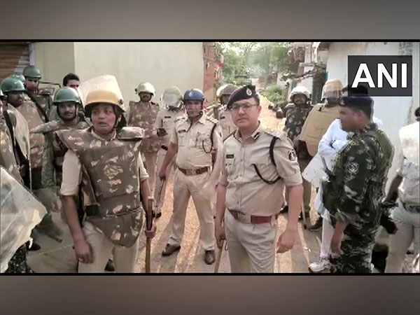 Police deployed in Birampur village, Bemetara after clashes between two groups. (Photo/ANI)