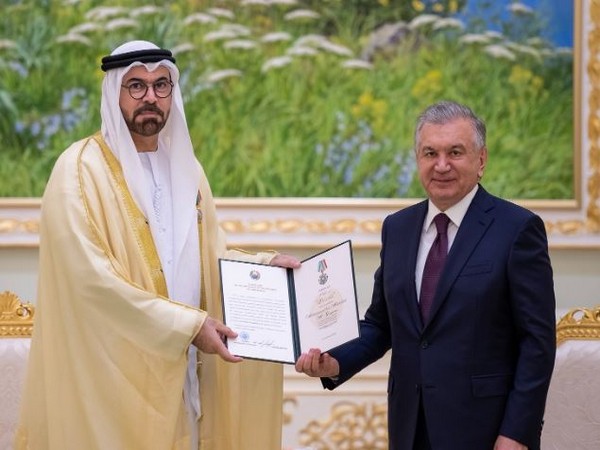 President of  Uzbekistan, Shavkat Mirziyoyev presents Mohammad bin Abdullah Al Gergawi, Minister of Cabinet Affairs, with the Order of Friendship. (Photo Credit - WAM)