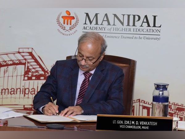 Lt. Gen. (Dr.) M. D. Venkatesh, Vice Chancellor of Manipal Academy of Higher Education, signing the partnership agreement with Nature Portfolio