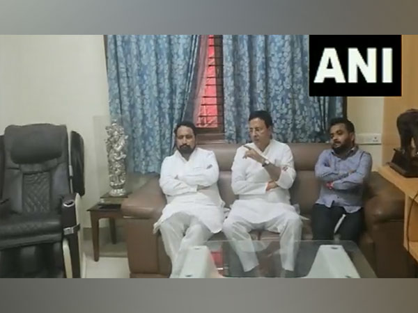 Laxman Savadi at Siddaramaiah's residence (Photo/ANI)