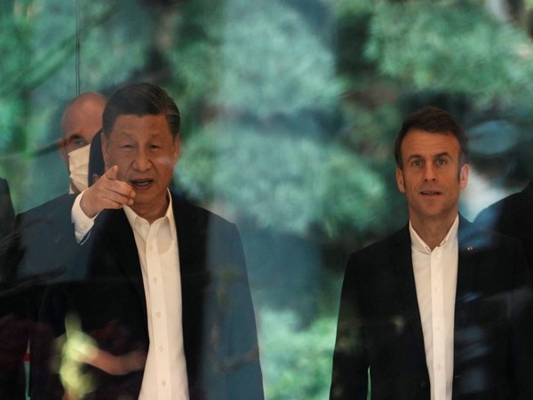 Chinese President Xi Jinping and French President Emmanuel Macron. (Photo Credit - Reuters)