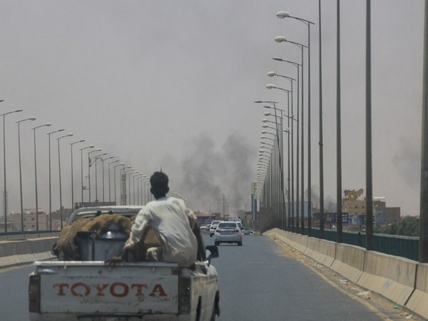 Smoke rises near Halfaya Bridge between Omdurman and Khartoum North in Sudan on Saturday. (Image Source: Reuters)