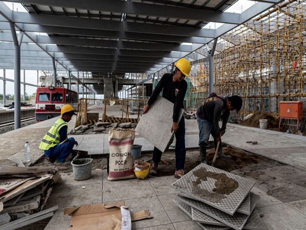 Workers construct the train depot construction site in Tegalluar. (Photo Credit - Reuters)