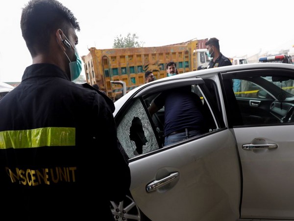 Site where, according to police, gunmen on a motorcycle opened fire on a Chinese national' vehicle in Karachi. (Photo Credit - Reuters)
