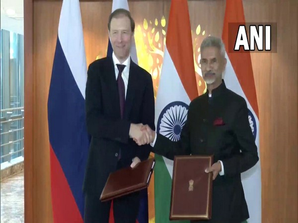 Deputy Prime Minister and Minister of Trade and Industry of the Russia, Denis Manturov and Indian EAM Jaishankar. (Photo/ANI)