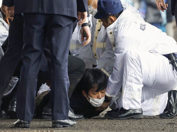 Suspect pinned down after he attacked Japanese PM Fumio Kishida. (Photo/Reuters)