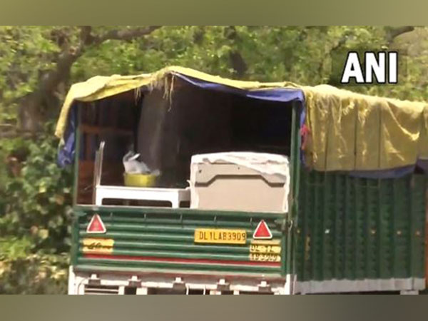 Trucks leave from Rahul Gandhi's 12 Tughlak Lane bungalow as he vacates the residence (Photo/ANI)