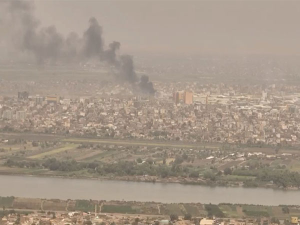 Smoke rising over the Khartoum North Light Industrial Area, in Bahri, Sudan. (Photo/Reuters)