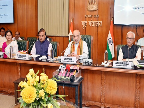 Amit Shah with Himanta Biswa Sarma and Ajay Kumar Bhalla during signing of tripartite agreement (Photo/ANI)