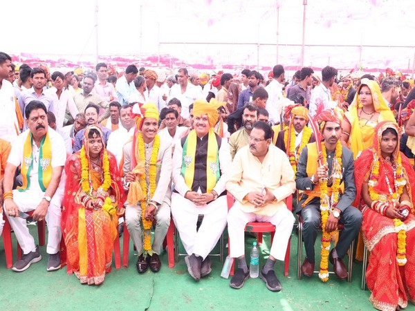 After listening to PM Modi's 'Mann ki Baat', 235 couples tied knot in mass wedding in MP. (Photo/ANI)