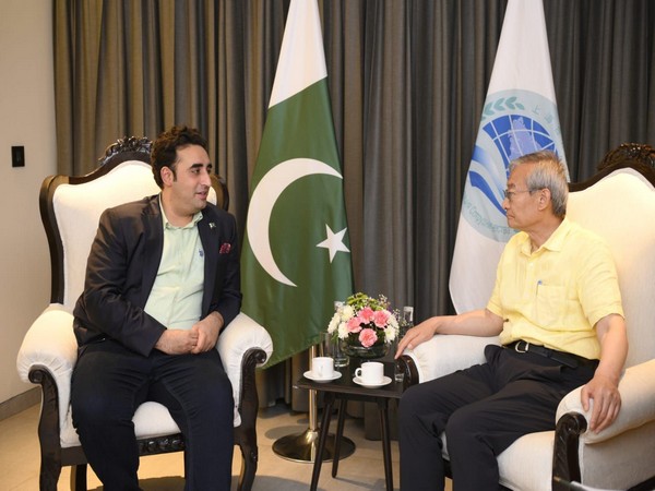 SCO Secretary-General Zhang Ming (left) with and Pak Foreign Minister Bilawal Bhutto Zardari. (Photo: Twitter//PPP)