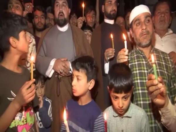 A candle light march in Srinagar against killings of Shia school teachers in Pakistan (Photo/ANI)